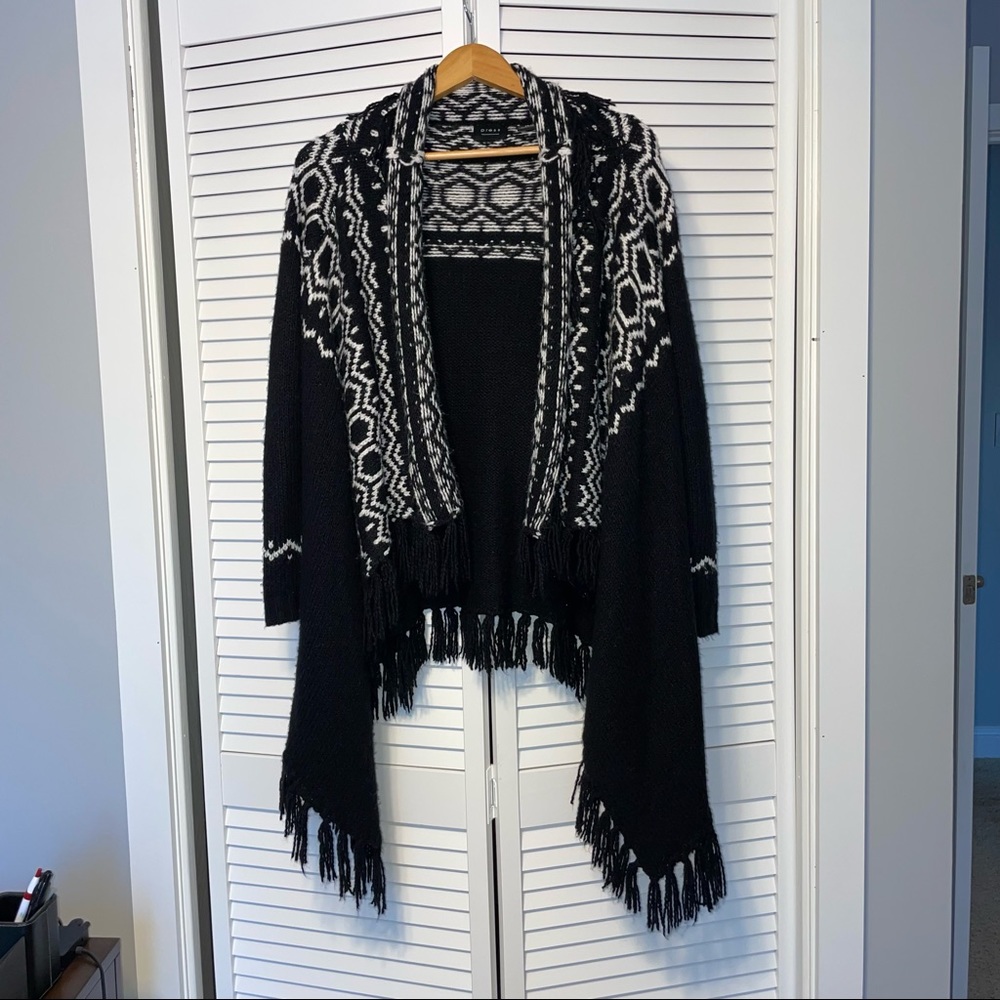 Press black and white sweater
